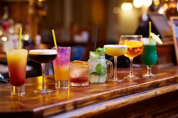 Row of freshly made cocktails along the bar at KTM ROX